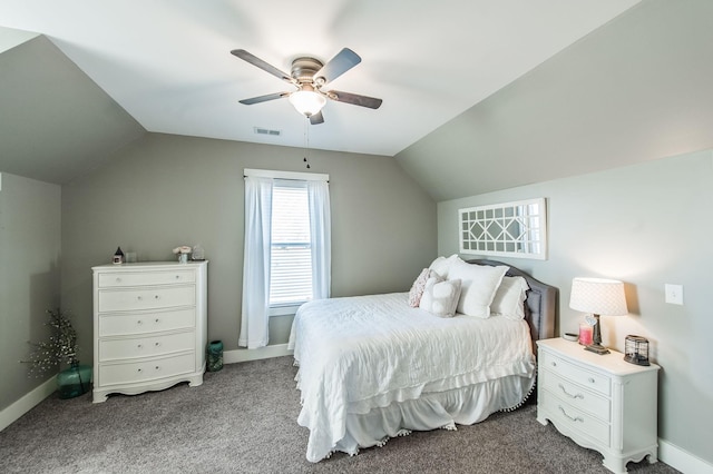 bedroom featuring ceiling fan, light colored carpet, and vaulted ceiling