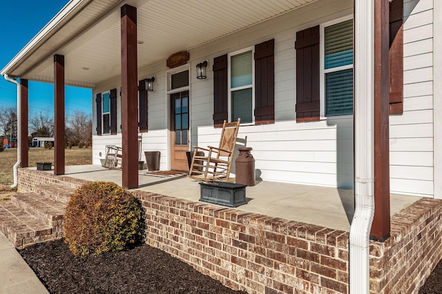 view of patio featuring covered porch