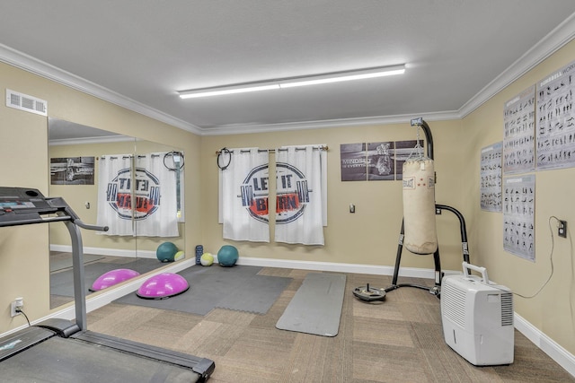 workout area with ornamental molding