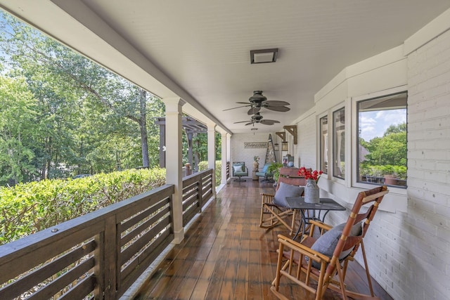 view of patio featuring ceiling fan