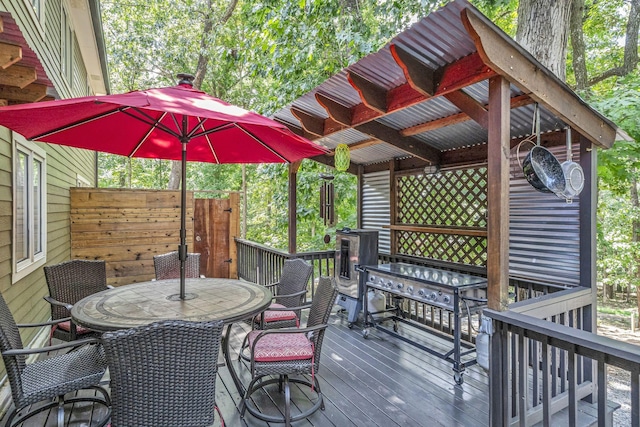 wooden deck with grilling area