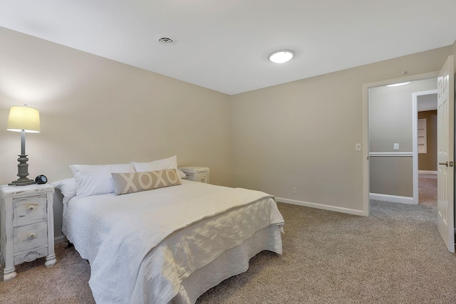 bedroom featuring carpet