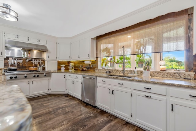 kitchen featuring decorative backsplash, dark wood-type flooring, white cabinets, and stainless steel appliances