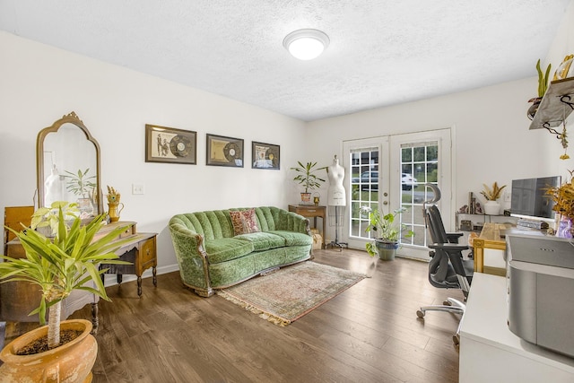 office featuring dark wood-type flooring, a textured ceiling, and french doors