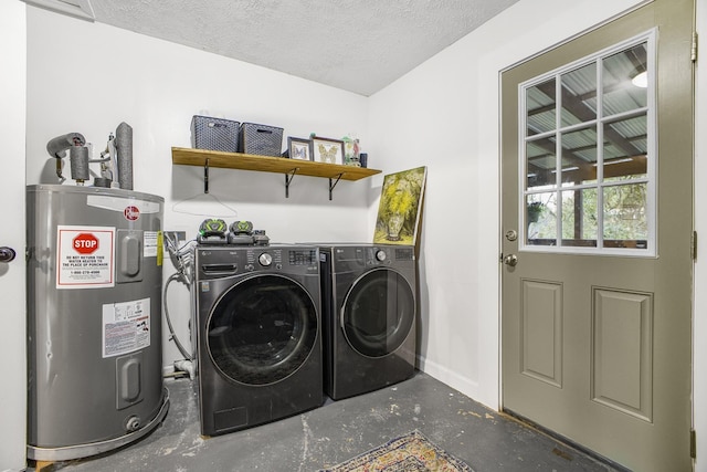 clothes washing area with electric water heater and a textured ceiling