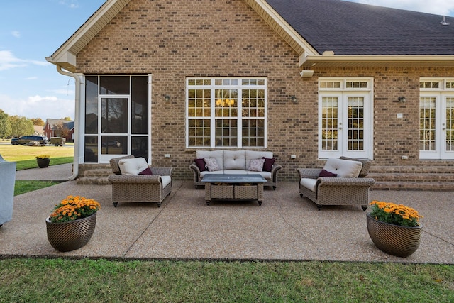 view of patio featuring an outdoor living space and french doors