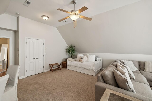 interior space featuring ceiling fan and lofted ceiling