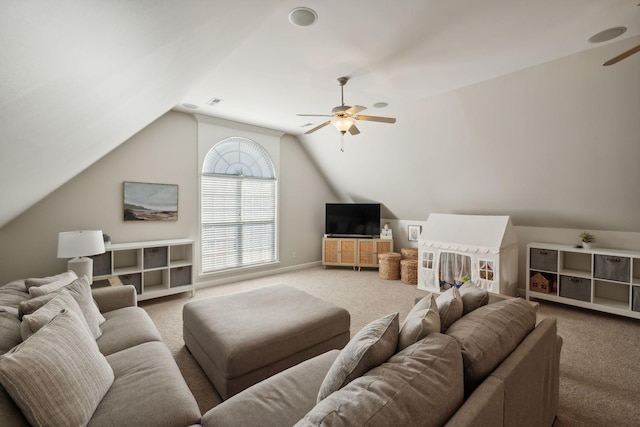 living room with ceiling fan, carpet, and lofted ceiling