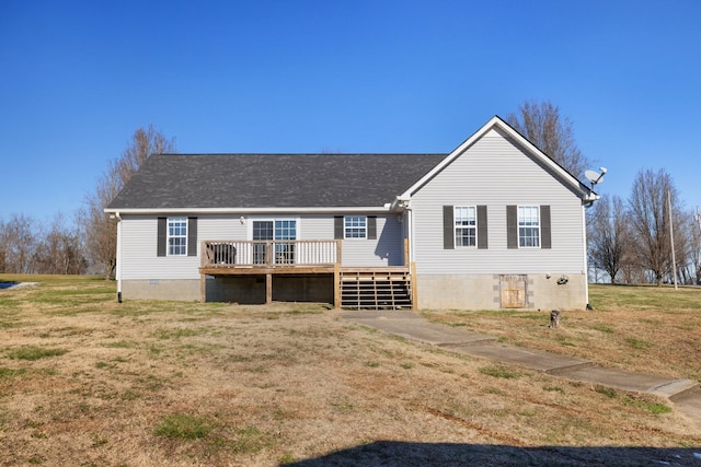 manufactured / mobile home with a front lawn and a wooden deck