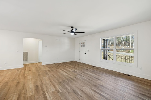 interior space with light hardwood / wood-style flooring and ceiling fan