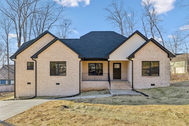 view of front of house with a porch and a front yard