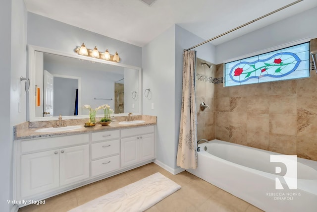 bathroom with vanity, shower / bathtub combination with curtain, and tile patterned flooring