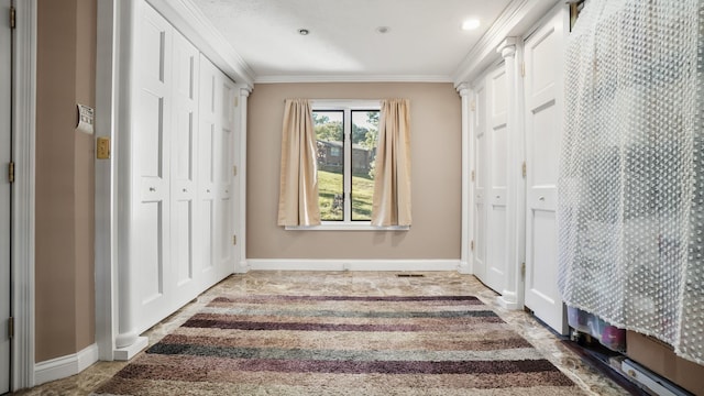 interior space featuring crown molding