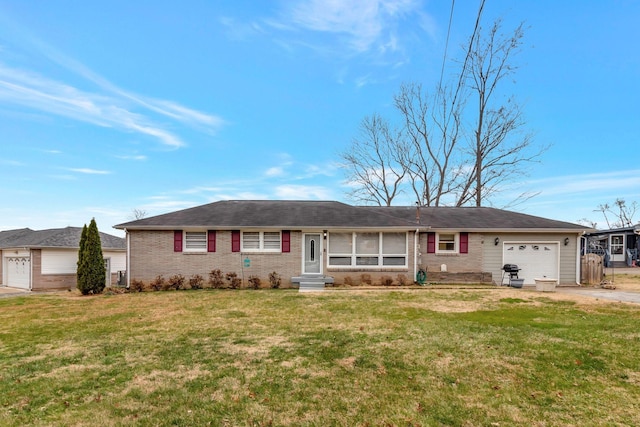 ranch-style house with a front yard and a garage