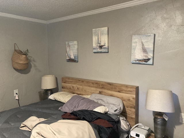 bedroom with ornamental molding and a textured ceiling