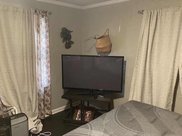 bedroom with crown molding