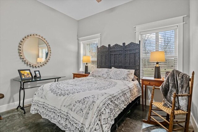 bedroom featuring multiple windows