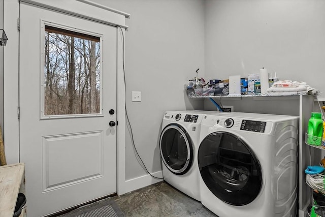 laundry room featuring washer and clothes dryer