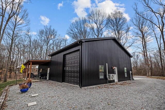 view of outdoor structure with a garage