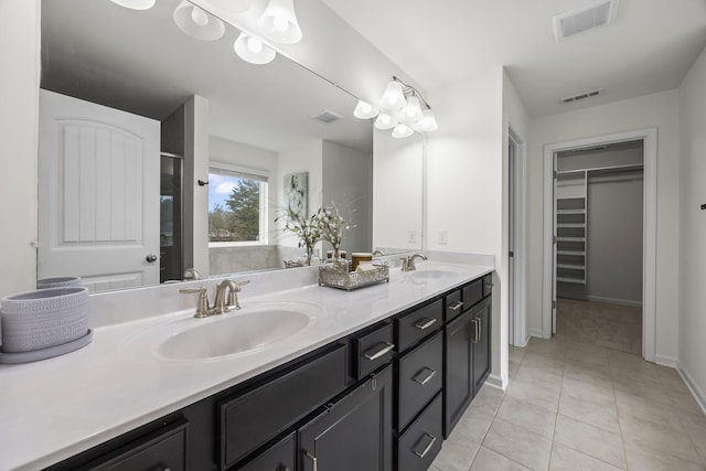 bathroom featuring vanity and tile patterned floors