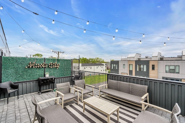 wooden deck featuring an outdoor hangout area