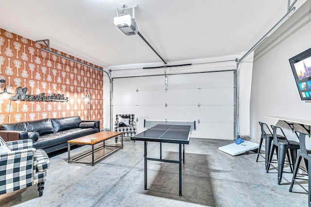 game room featuring concrete flooring