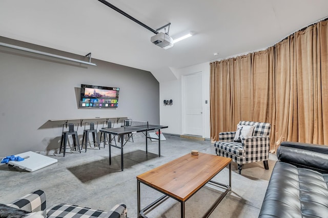 living room with lofted ceiling