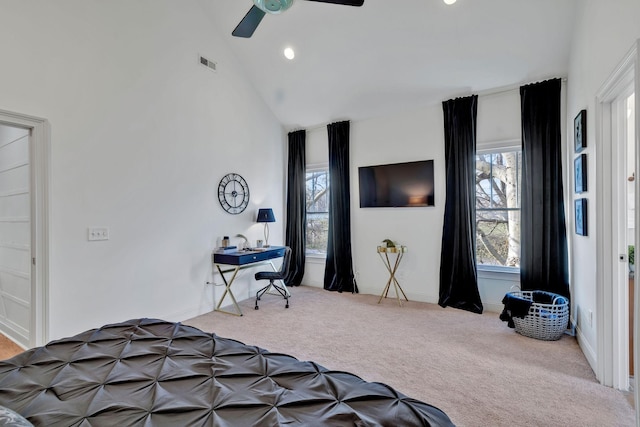 carpeted bedroom featuring ceiling fan and high vaulted ceiling