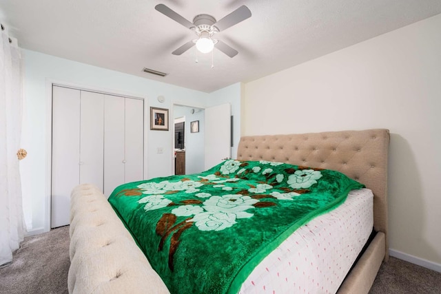 bedroom with carpet flooring, ceiling fan, and a closet