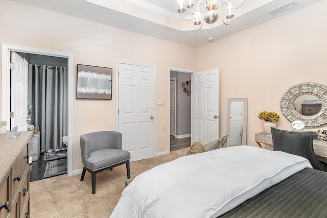 carpeted bedroom with a raised ceiling and a chandelier