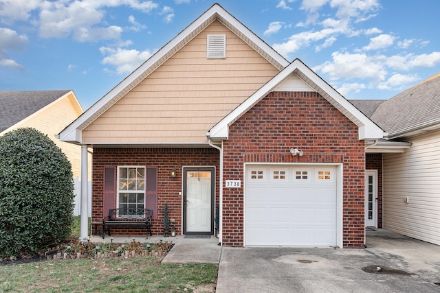 view of property featuring a porch and a garage