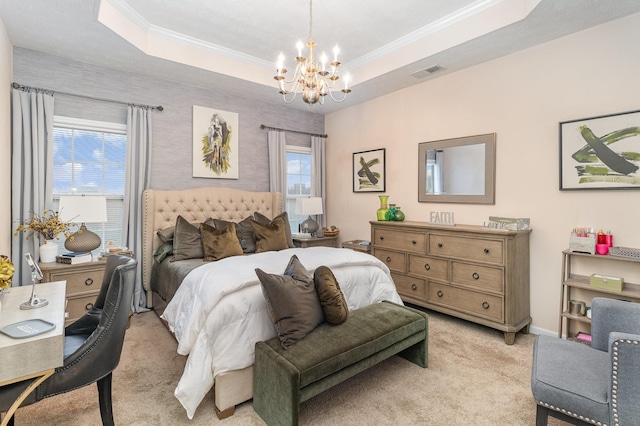 carpeted bedroom with a raised ceiling, ornamental molding, and an inviting chandelier