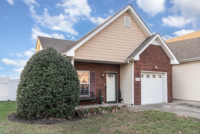 view of front of home with a garage