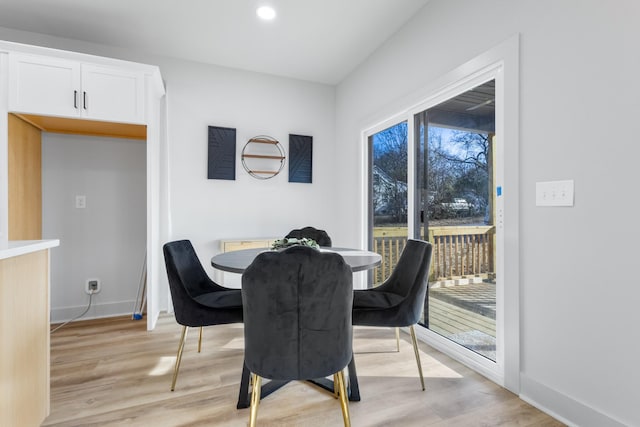 dining room featuring light hardwood / wood-style flooring