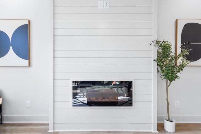 details with wood-type flooring