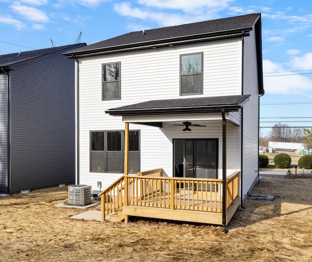 back of house featuring central air condition unit, ceiling fan, and a deck