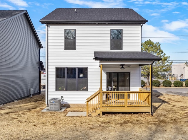 back of house with ceiling fan and cooling unit