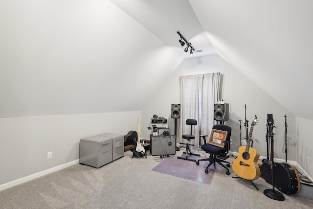 exercise room with light carpet and lofted ceiling