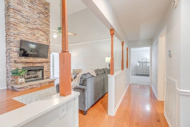 hall with light hardwood / wood-style floors