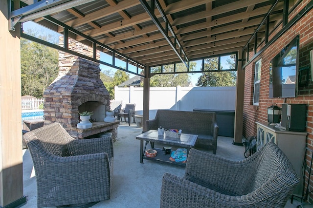 view of patio / terrace featuring an outdoor living space with a fireplace