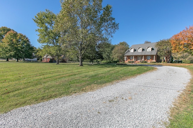 exterior space featuring a front yard