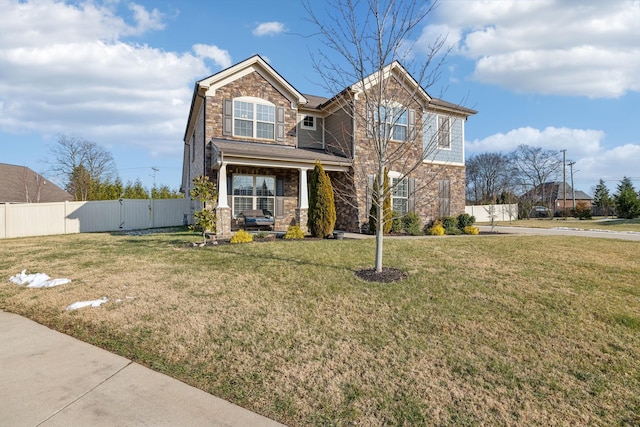 craftsman house featuring a front lawn