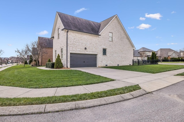 view of property exterior featuring a lawn and a garage