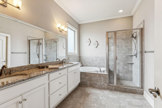 bathroom featuring vanity, shower with separate bathtub, and ornamental molding