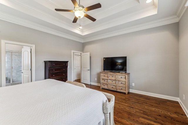 bedroom featuring ceiling fan, dark hardwood / wood-style flooring, crown molding, and a tray ceiling