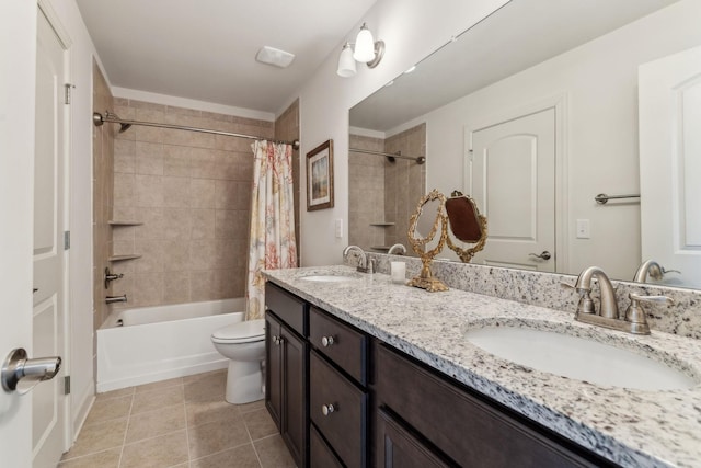 full bathroom featuring toilet, tile patterned floors, vanity, and shower / tub combo with curtain