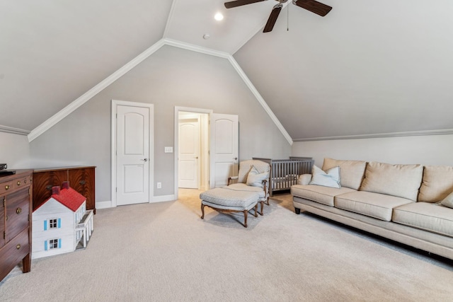 carpeted living room featuring ceiling fan, lofted ceiling, and ornamental molding