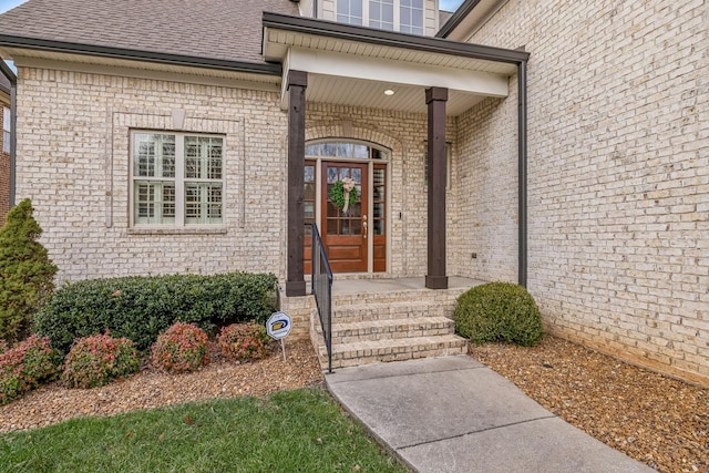 entrance to property with a porch