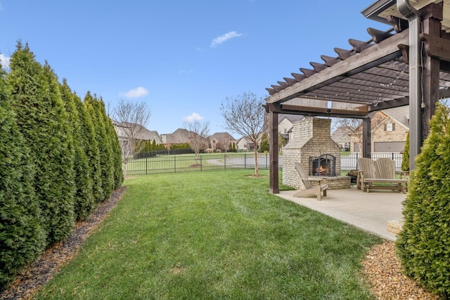 view of yard featuring an outdoor brick fireplace, a patio area, and a pergola