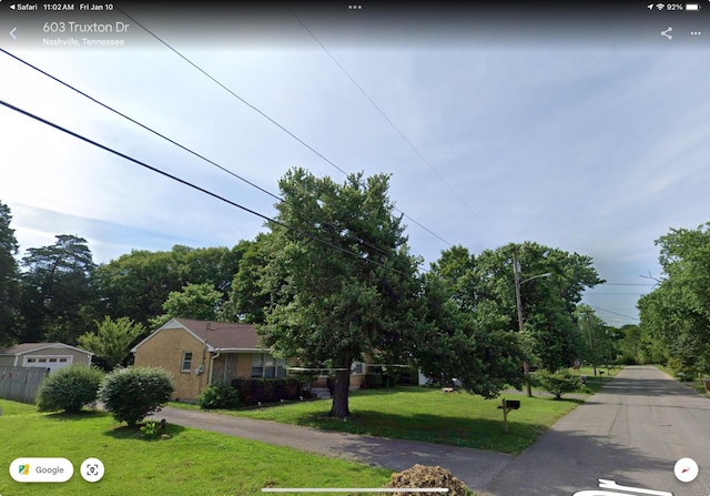 view of front of property with a front lawn